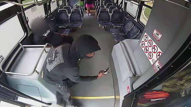 PHOTO: The Charlotte Area Transit System released surveillance footage of a shootout between a passenger and the bus driver that occurred on May 18, 2023. In this still, the passenger can be seen pulling out a handgun. (Charlotte Area Transit System)