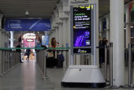 A general view of the Eurostar checkin area at London's St Pancras station in Monday, March 16, 2020. Eurostar services to Europe from London are still running, though they are no longer able to serve food on board and there are advisory signs about the Coronavirus at the entrance to the check-in. The vast majority of people recover from the new coronavirus. According to the World Health Organization, most people recover in about two to six weeks, depending on the severity of the illness.(AP Photo/Alastair Grant)