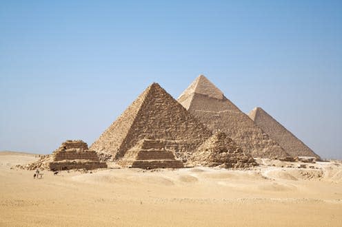 <span class="caption">Khufu's pyramid is the largest in the Giza pyramid complex.</span> <span class="attribution"><span class="source">Ricardo Liberato/wikipedia</span>, <a class="link " href="http://creativecommons.org/licenses/by-sa/4.0/" rel="nofollow noopener" target="_blank" data-ylk="slk:CC BY-SA;elm:context_link;itc:0;sec:content-canvas">CC BY-SA</a></span>