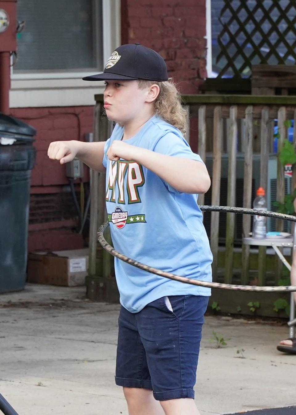 Jason Paulette, 11, of Adrian was the winner of the hula hoop contest Tuesday, Aug. 9, 2022, at Nova's Soda Pop Candy Shop in downtown Adrian. The hula hoop contest was part of the vintage store's monthly Tuesday at Nova's community event and its 20th anniversary celebration.