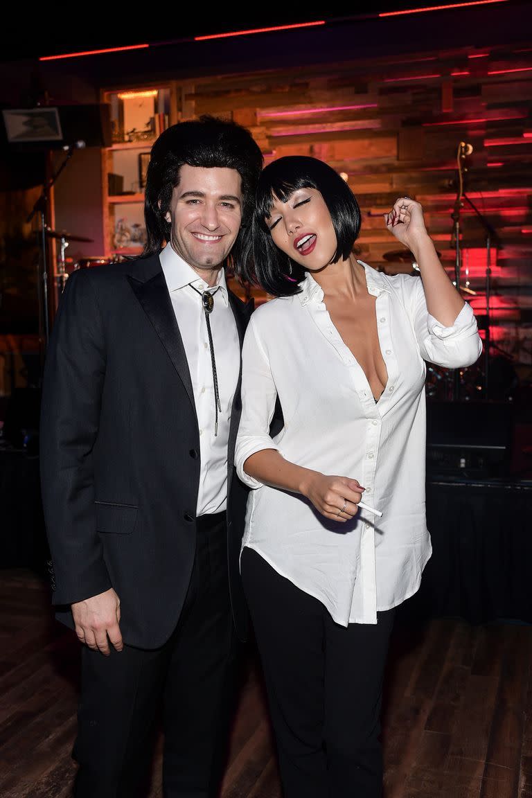 <p>With the help of a bolo tie and a short bobbed wig, you can easily become <em>Pulp Fiction</em>'s Vincent and Mia (though you'll get bonus points if you perform their dance at a Halloween party).</p><p><a class="link " href="https://www.amazon.com/Handmade-Round-Shape-Western-Cowboy/dp/B06Y62JVZ1?tag=syn-yahoo-20&ascsubtag=%5Bartid%7C10070.g.2683%5Bsrc%7Cyahoo-us" rel="nofollow noopener" target="_blank" data-ylk="slk:SHOP BOLO TIE">SHOP BOLO TIE</a></p><p><a class="link " href="https://www.amazon.com/dp/B08HSX96CS?tag=syn-yahoo-20&ascsubtag=%5Bartid%7C10070.g.2683%5Bsrc%7Cyahoo-us" rel="nofollow noopener" target="_blank" data-ylk="slk:SHOP BOBBED WIG">SHOP BOBBED WIG</a></p>
