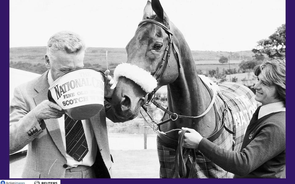 Red Rum with trainer Ginger McCain - Credit: Action Images