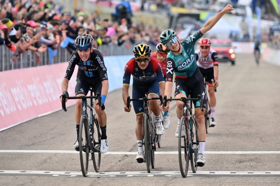 Australia’s Jai Hindley (right) crosses the finish line to win the ninth stage of the Giro D’Italia (Massimo Paolone/LaPresse via AP) (AP)