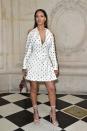 <p>In a black and white embellished Dior dress, Chopard Jewelry and strappy sandals at the Dior Spring 2017 show during Paris Fashion Week. </p>