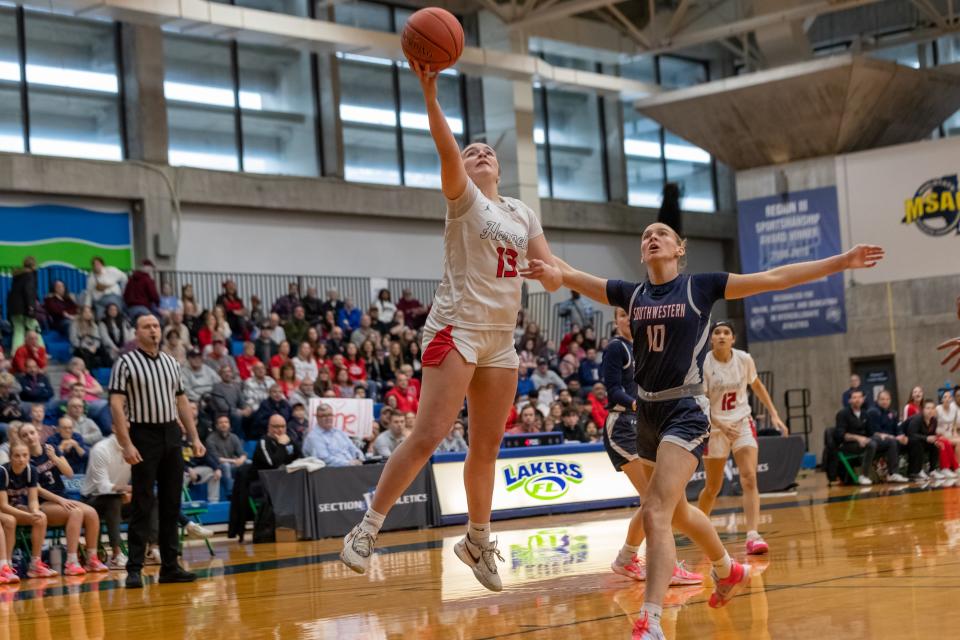 Hornell's Raegan Evingham glides to the hoop during Saturday's Far West Regional matchup with Southwestern at FLCC. Southwestern edged the Red Raiders, 63-61.
