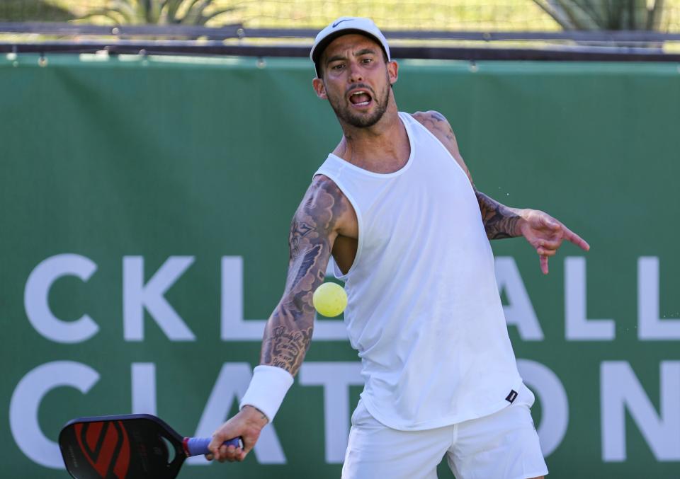 Tyson McGuffin, returning the ball while playing mixed doubles during the Pro Pickleball Association Masters tournament in La Quinta, Calif. on Friday, Nov. 12, 2021, has big plans for the next year.