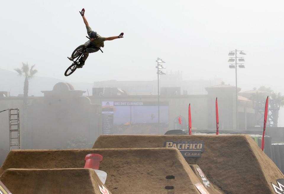 Brady Baker performs a tuck no hander at the BMX Dirt Elimination at the X Games competition at the Ventura County Fairgrounds on Friday.