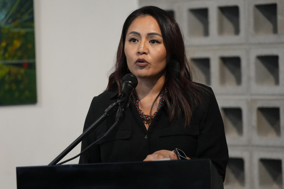 Amanda Blackhorse speaks during a news conference by Native American advocacy groups, Thursday, Feb. 9, 2023, in Phoenix. The groups are calling for the NFL football team Kansas City Chiefs to drop their name, logo and their trademark “war chant” where fans make a chopping-hand gesture mimicking the Native American tomahawk. They play to demonstrate outside State Farm Stadium in the Phoenix suburb of Glendale during the Super Bowl 57 NFL football game. (AP Photo/Rick Scuteri)