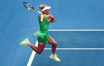 Caroline Wozniacki: Green and golden girl