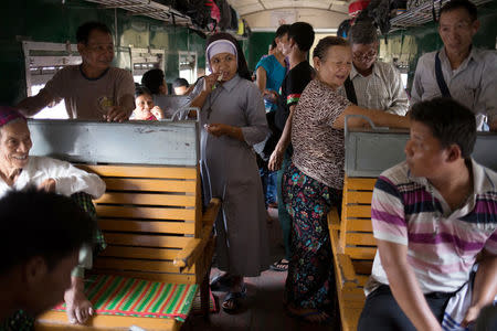 Catholics from Kachin state travel during a two-day train trip from Myitkyina to Yangon to attend Pope Francis' visit to Myanmar next week, November 23, 2017. REUTERS/Ann Wang