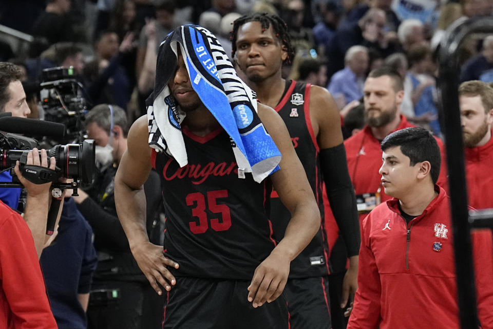 Houston forward Fabian White Jr. leaves the court after their loss against Villanova during a college basketball game in the Elite Eight round of the NCAA tournament on Saturday, March 26, 2022, in San Antonio. (AP Photo/Eric Gay)