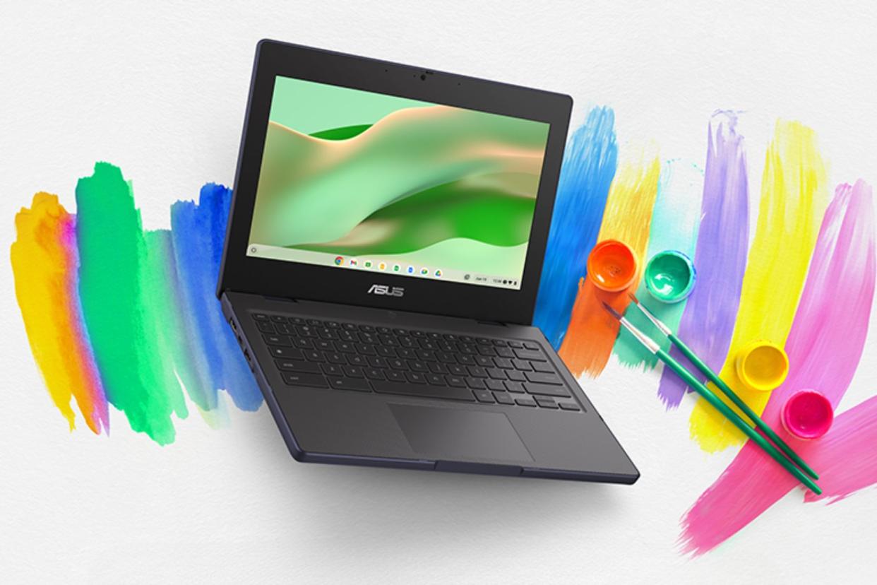 the amazon laptop against a background of paint swatches 