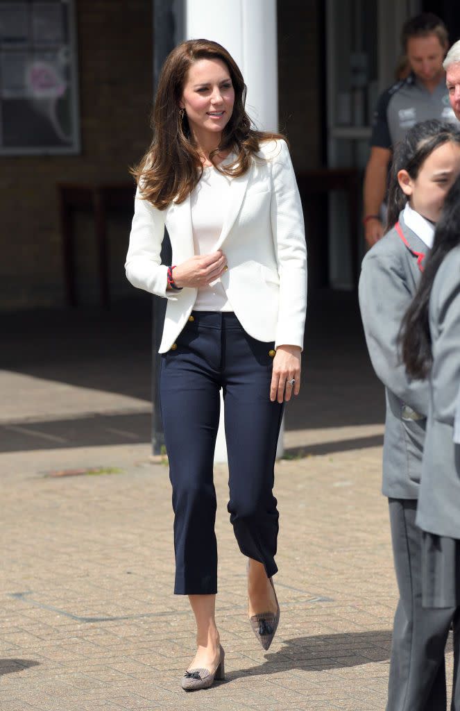 <p><em>June</em><em> 16, 2017</em><em> —</em><span class="redactor-invisible-space"> The Duchess kept things perfectly nautical during a marine-themed roadshow hosted by 1851 Trust. She wore a tailored <a href="https://www.zara.com/us/en/buttoned-cropped-blazer-p08215125.html?v1=24655670&v2=1428660" rel="nofollow noopener" target="_blank" data-ylk="slk:white blazer;elm:context_link;itc:0;sec:content-canvas" class="link ">white blazer </a> and also cropped sailor pants from J.Crew. She completed her look with a pair of tweed heels, also from J.Crew. </span> </p>