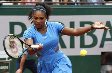 Tennis - French Open - Roland Garros - Serena Williams of the U.S v Kristina Mladenovic of France - Paris, France - 28/05/16. Williams returns a shot. REUTERS/Jacky Naegelen