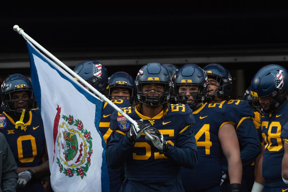 Dec 31, 2020; Memphis, TN, USA; DUPLICATE West Virginia Mountaineers players prepare to enter to field before the game against the Army Black Knights at Liberty Bowl Stadium. Mandatory Credit: Justin Ford-USA TODAY Sports