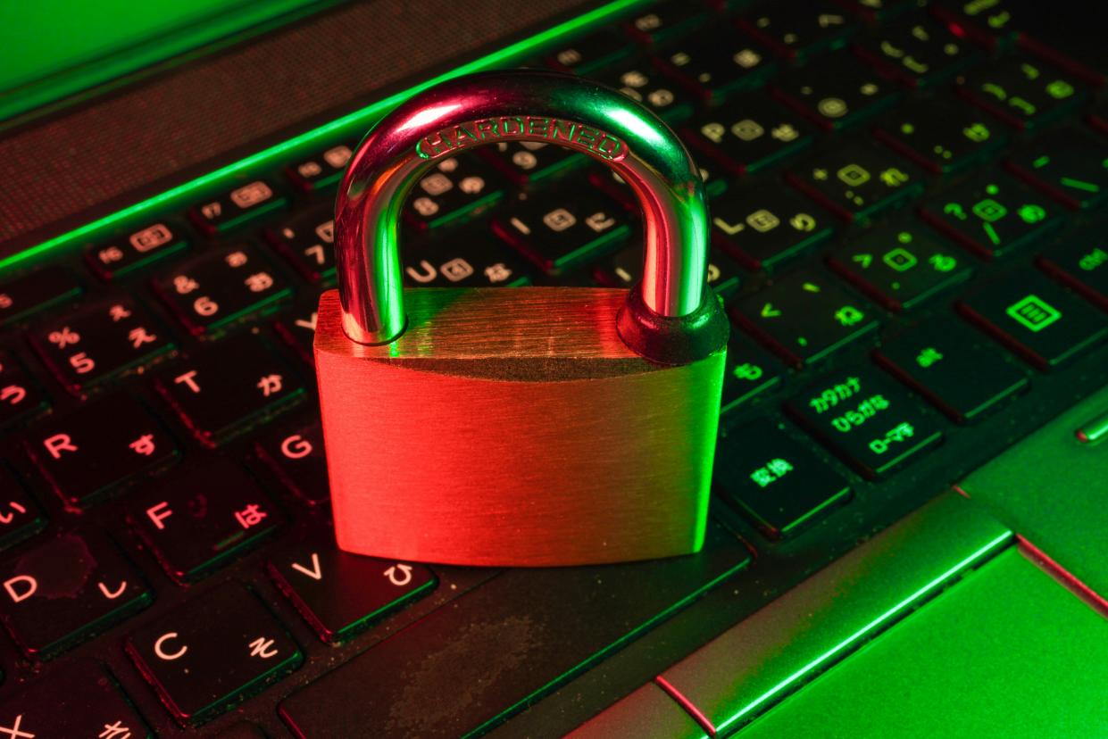  A lock sitting on a keyboard. 