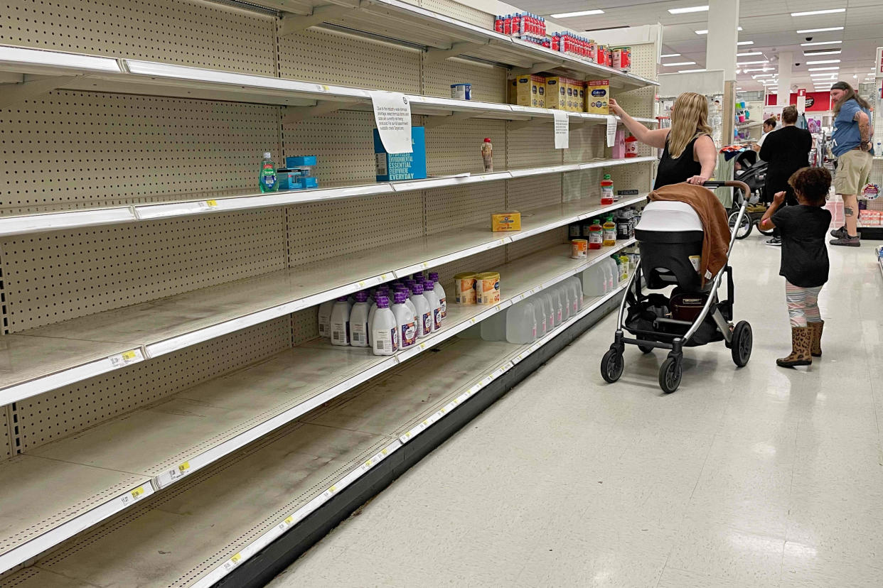 A woman shops for baby formula (Jim Watson / AFP - Getty Images)