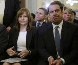 General Motors CEO Mary Barra (L) and GM Executive Vice President Mark Reuss (R) await Barra's testimony before the Senate Commerce and Transportation Consumer Protection, Product Safety and Insurance subcommittee in Washington April 2, 2014. REUTERS/Gary Cameron