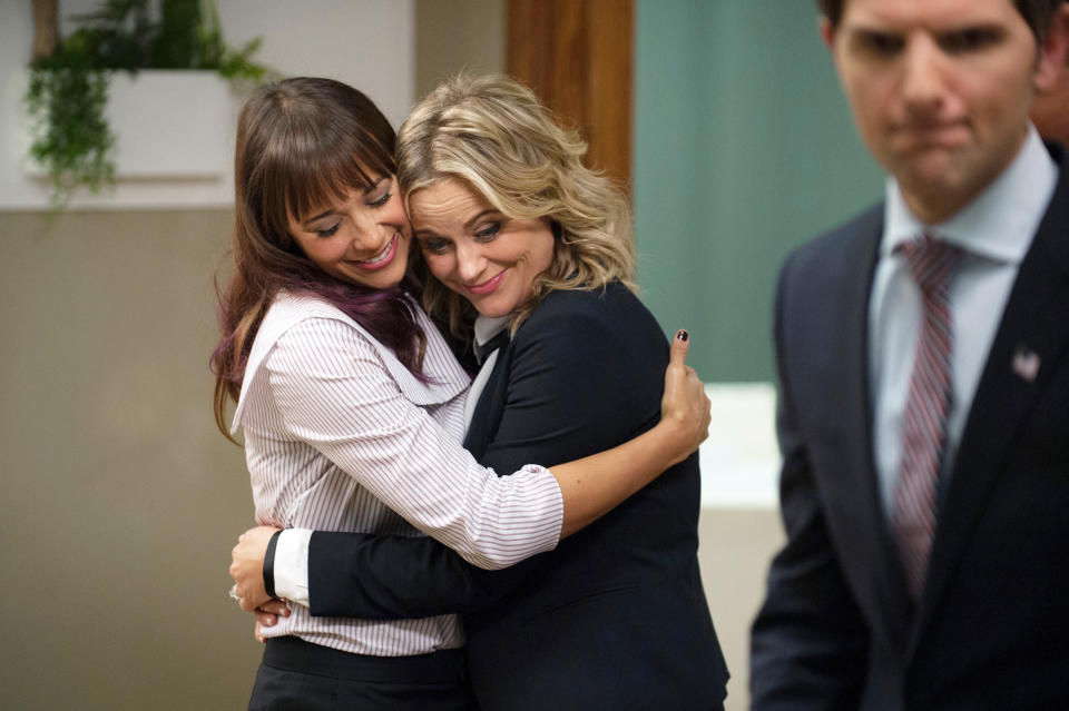 Rashida Jones and Amy Poehler hug