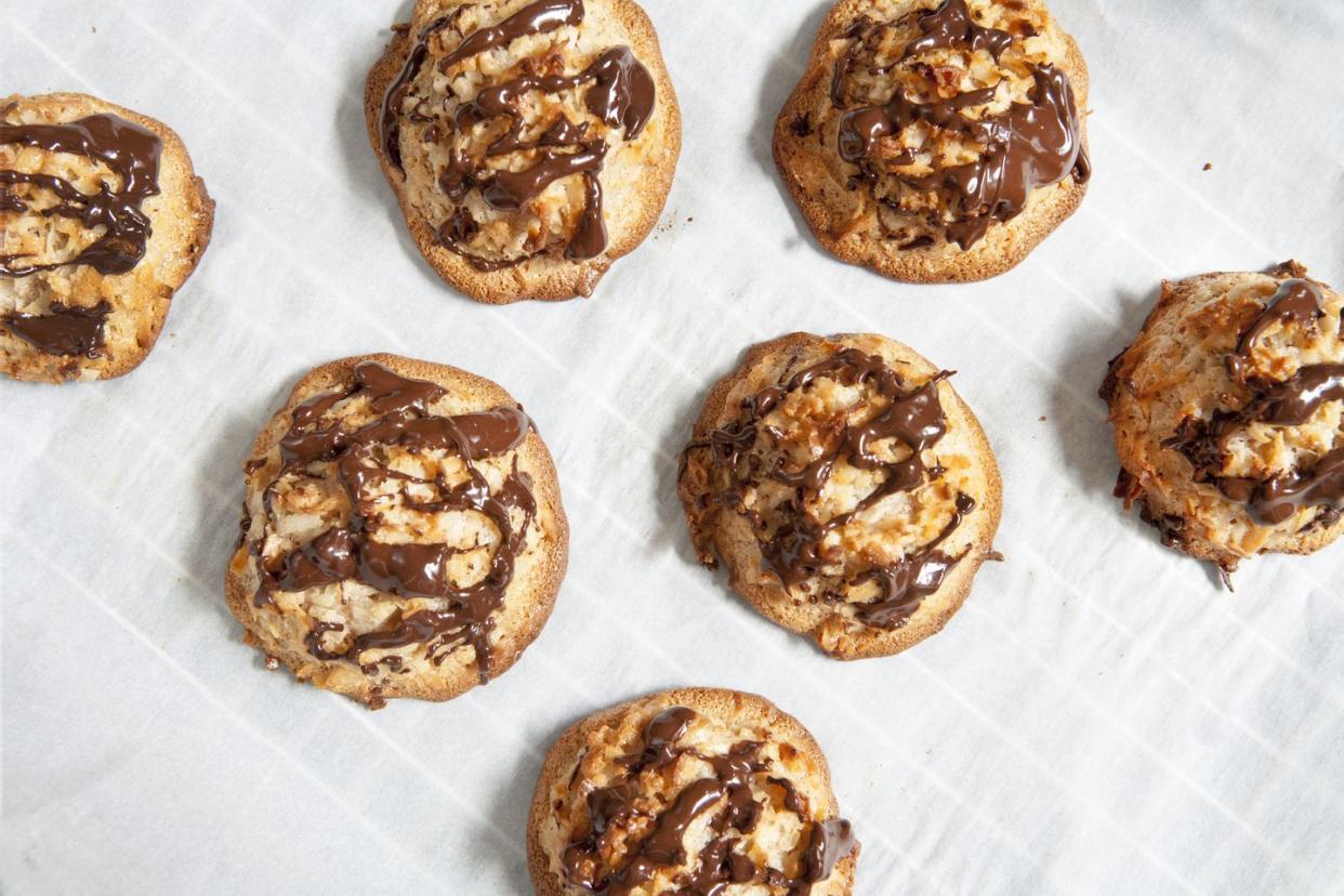 a close up of coconut macaroons with chocolate