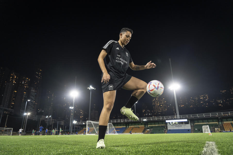 Gina Benjamin, vice captain of a women's seven-a-side team, poses for photographs during an interview in Hong Kong, Tuesday, Oct. 31, 2023. Set to launch on Friday, Nov. 3, 2023, the first Gay Games in Asia are fostering hopes for wider LGBTQ+ inclusion in the Asian financial hub. (AP Photo/Chan Long Hei)