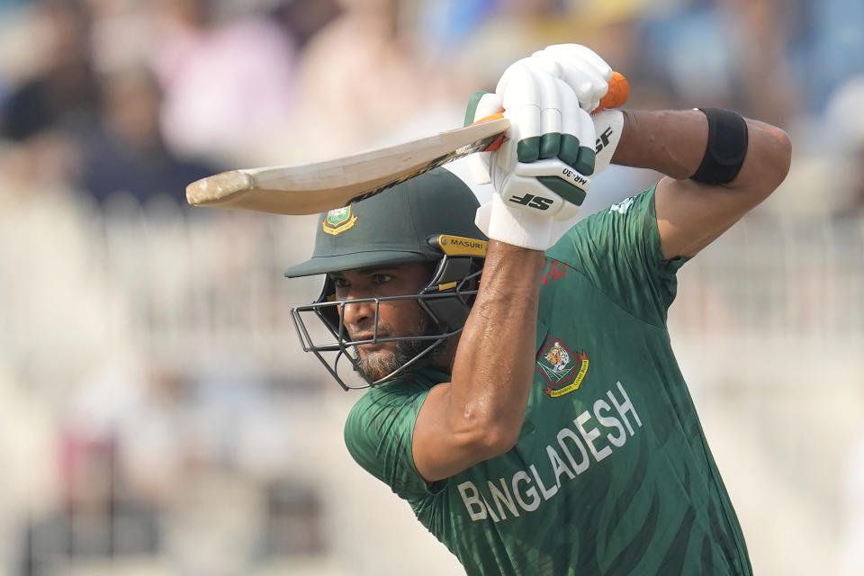 Bangladesh's Mohammad Mahmudullah plays a shot during the ICC Men's Cricket World Cup match between Bangladesh and Pakistan in Kolkata, India, Tuesday, Oct. 31, 2023. (AP Photo/Bikas Das)