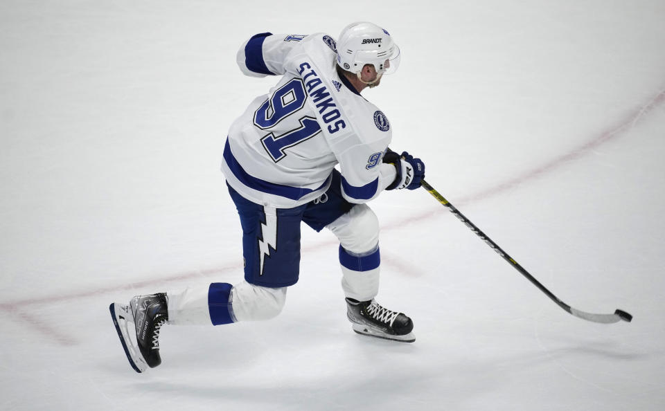 Tampa Bay Lightning center Steven Stamkos scores a goal during the shootout in an NHL hockey game against the Colorado Avalanche Tuesday, Feb. 14, 2023, in Denver. (AP Photo/David Zalubowski)