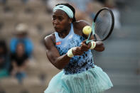 Coco Gauff of the U.S. plays a shot against Canada's Rebecca Marino during their first round match at the French Open tennis tournament in Roland Garros stadium in Paris, France, Sunday, May 22, 2022. (AP Photo/Thibault Camus)