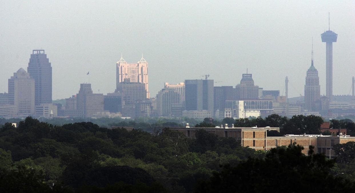 FILE - The skyline of San Antonio's downtown business district is pictured, May 3, 2007. Eight of the 10 largest cities in the U.S. lost population during the first year of the pandemic, with only Phoenix and San Antonio gaining new residents from 2020 to 2021, according to new estimates, released Thursday, May 26, 2022, by the U.S. Census Bureau. (AP Photo/Mel Evans, File)