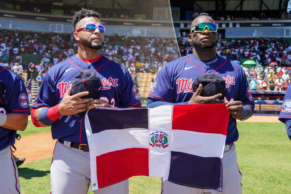 SANTO DOMINGO, DOM - MARCH 07: Nelson Cruz #23 and Miguel Sano #22 of the Minnesota Twins look on prior to a spring training game between the Minnesota Twins and the Detroit Tigers at Estadio Quisqueya Juan Marichal on March 7, 2020 in Santo Domingo, Dominican Republic. (Photo by Brace Hemmelgarn/Minnesota Twins/Getty Images)