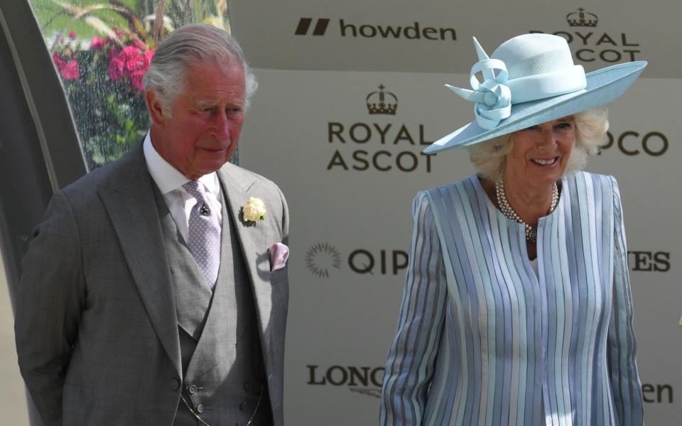 Prince Charles, Prince of Wales and Camilla, Duchess of Cornwall attend the first day  - AFP