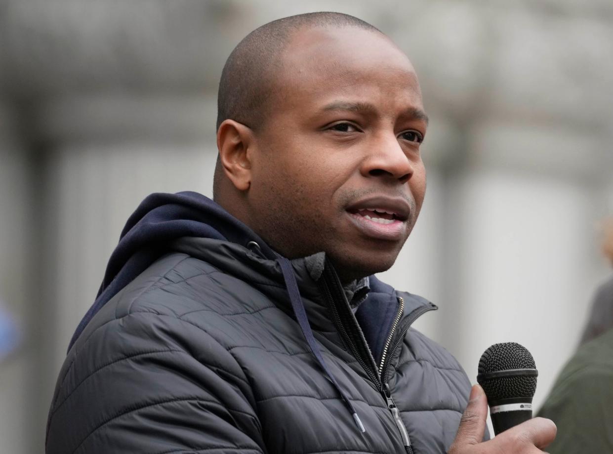 Milwaukee Mayor Cavalier Johnson speaks outside U.S. Senator Ron Johnson’s office, at the Federal Courthouse on East Wisconsin Avenue during the march for immigration reform in Milwaukee on Sunday, May 1, 2022. The event included immigrant essential workers and families, as well as allies in the faith, labor, LGBTQ, reproductive justice, and social justice communities supporting immigration reform. Photo by Mike De Sisti / The Milwaukee Journal Sentinel