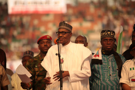 FILE PHOTO: Nigeria's President Muhammadu Buhari speaks a launch campaign for his re-election, in Uyo, Nigeria December 28, 2018. REUTERS/Tife Owolabi/File Photo