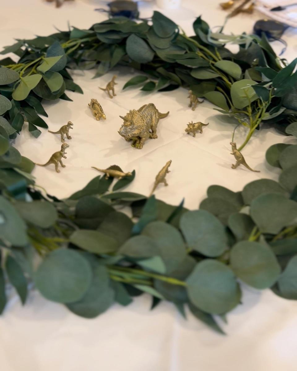 Devon Mendoza will have a Jurassic Park/Notre Dame themed wedding in May. She had a "Our Love is Dino-Mite" themed wedding shower and plans to use many of the same elements, like these centerpieces, in her wedding.