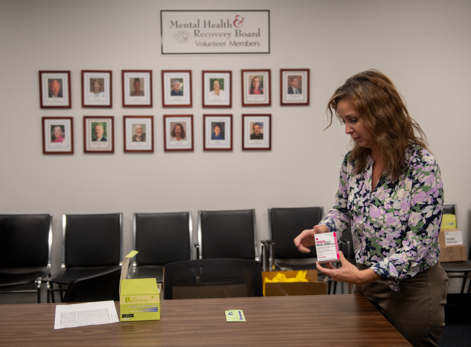 Karyn Kravetz, associate director Mental Health and Recovery Board of Portage County, with items set to be given out at the Kent Gazebo International Overdose Awareness Day event this Thursday.