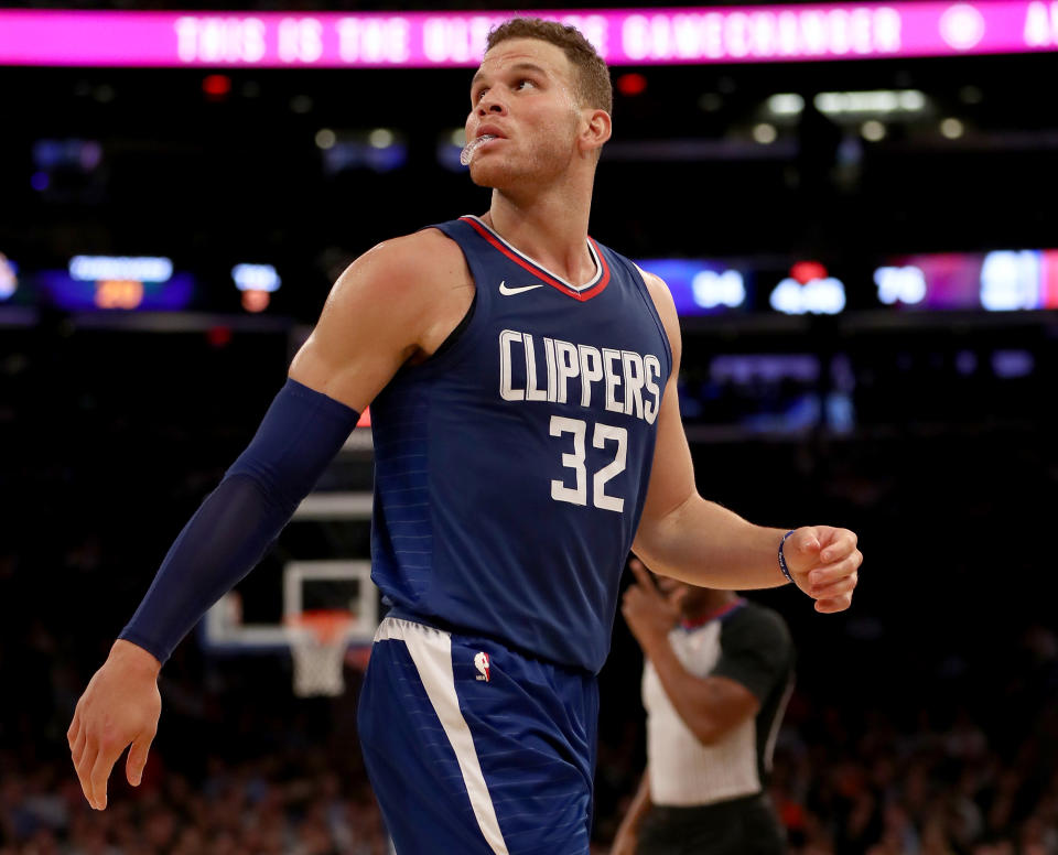 Blake Griffin looks up at the spot he and the Clippers used to occupy in the standings. (Getty)