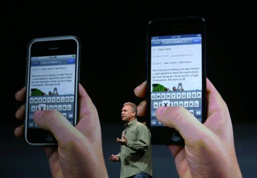 Apple Senior Vice President of worldwide product marketing Phil Schiller announces the new iPhone 5 during an Apple special event at the Yerba Buena Center for the Arts in San Francisco, California