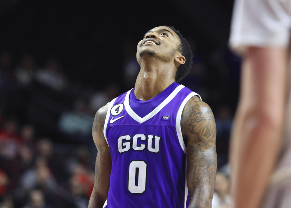 Grand Canyon guard Rayshon Harrison (0) looks up after a free-throw during the second half of an NCAA college basketball game against Southern Utah in the championship of the Western Athletic Conference tournament Saturday, March 11, 2023, in Las Vegas. (AP Photo/Ronda Churchill)