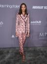 Joan Smalls brought a hint of spring to the red carpet at the amfAR gala in a Dolce & Gabbana printed pant suit. New York, February 7, 2018