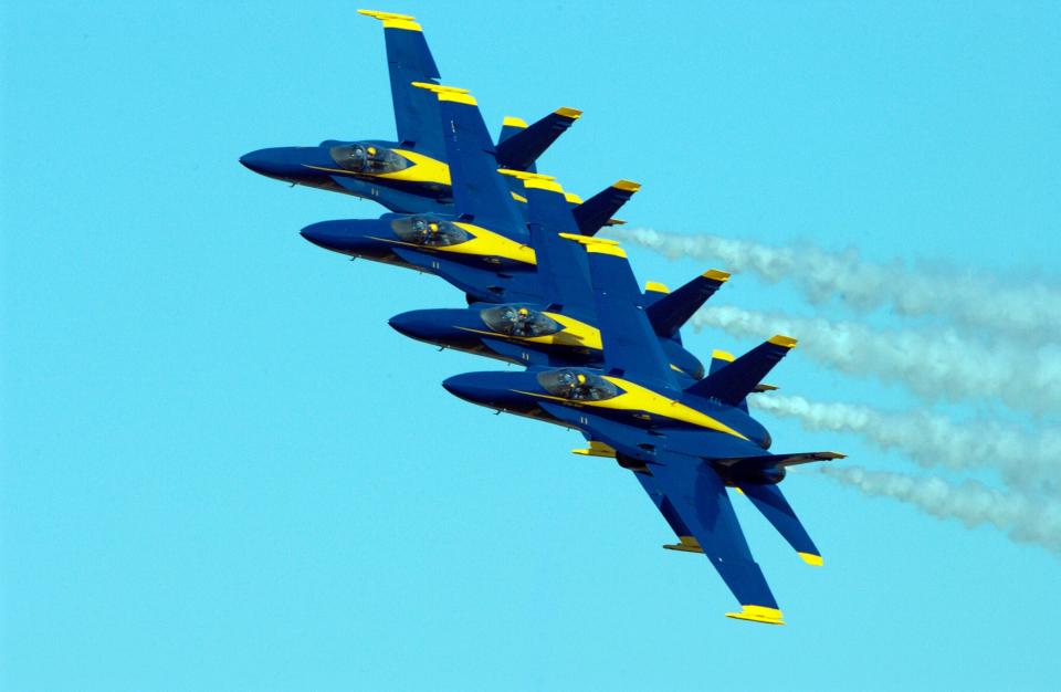 The Navy’s Blue Angels flight demonstration team maintains a tight formation thrilling the audience, estimated at 100,000 spectators, at Sherman Field onboard Naval Air Station (NAS) Pensacola. The homecoming air show signifies the final performance of the season for the team that is based here. U.S.