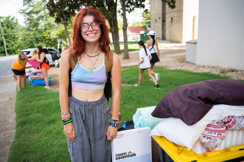 University of Tennessee freshman Zoe Wyatt is photographed with her belongings outside of Carrick Hall during move-in day on Wednesday, August 16, 2023.