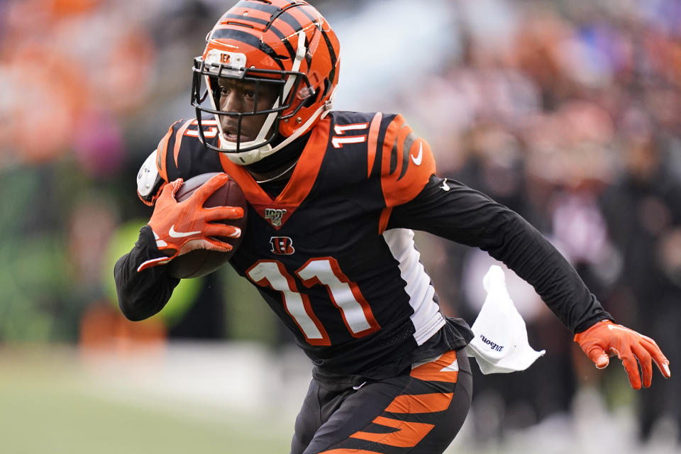 FILE - Cincinnati Bengals wide receiver John Ross (11) rushes during the second half of an NFL football game against the Cleveland Browns, Sunday, Dec. 29, 2019, in Cincinnati. Ross was the top performer in the 40-yard dash at the 2017 NFL scouting combine. (AP Photo/Bryan Woolston, File)