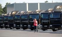 FILE PHOTO: Vehicles of United Parcel Service are seen at the new package sorting and delivery UPS hub in Corbeil-Essonnes and Evry