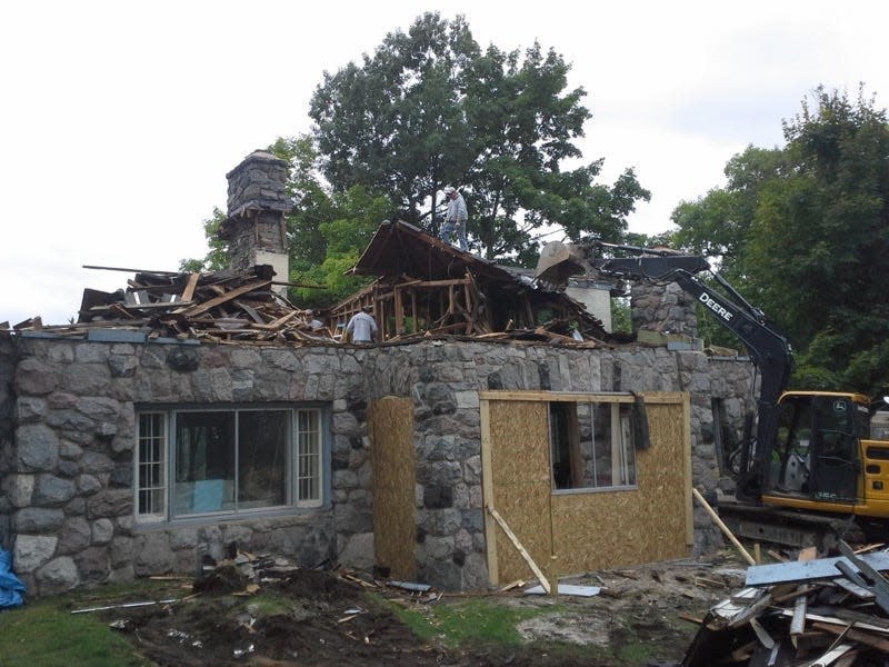 Seitz had the old shingle roof completely torn down.