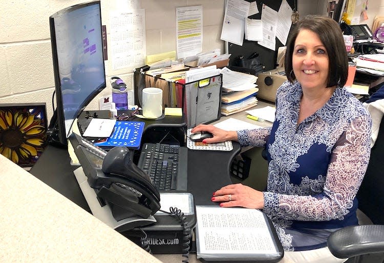 Office Manager Carla Douglas at her desk at the Knox Educational Service Center.