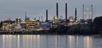 FILE - The main chemical plant of German Bayer AG is pictured on Thursday, Aug. 9, 2019 in Leverkusen, Germany. A low-rise city of 167,000 that grew up around the factories of the pharmaceuticals giant Bayer, Leverkusen has little to draw tourists besides its internationally famed soccer club. The team finished an entire German Bundesliga season unbeaten Saturday and is now targeting trophies in the Europa League and German Cup. (AP Photo/Martin Meissner, File)