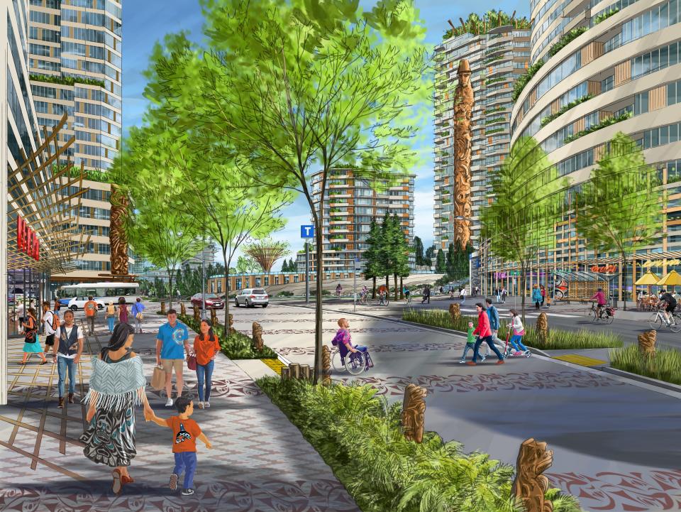 A public walkway with gray stones and multiple trees in the Jericho Lands development 