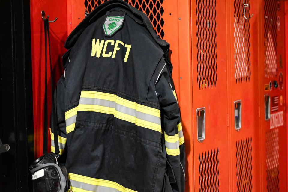 A Southwest Central firefighter's jacket hangs on lockers at Station 41, located at 23626 Fillmore Road, South Bend.