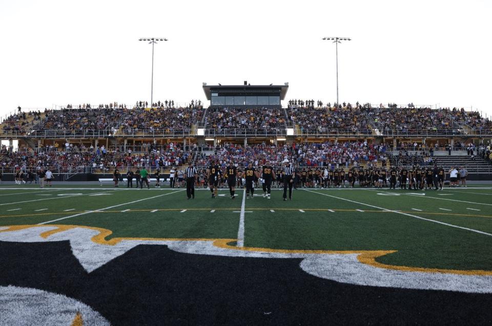 A large crowd gathers for the first game at Southeast Polk's football stadium Friday, Sept. 8, 2023.