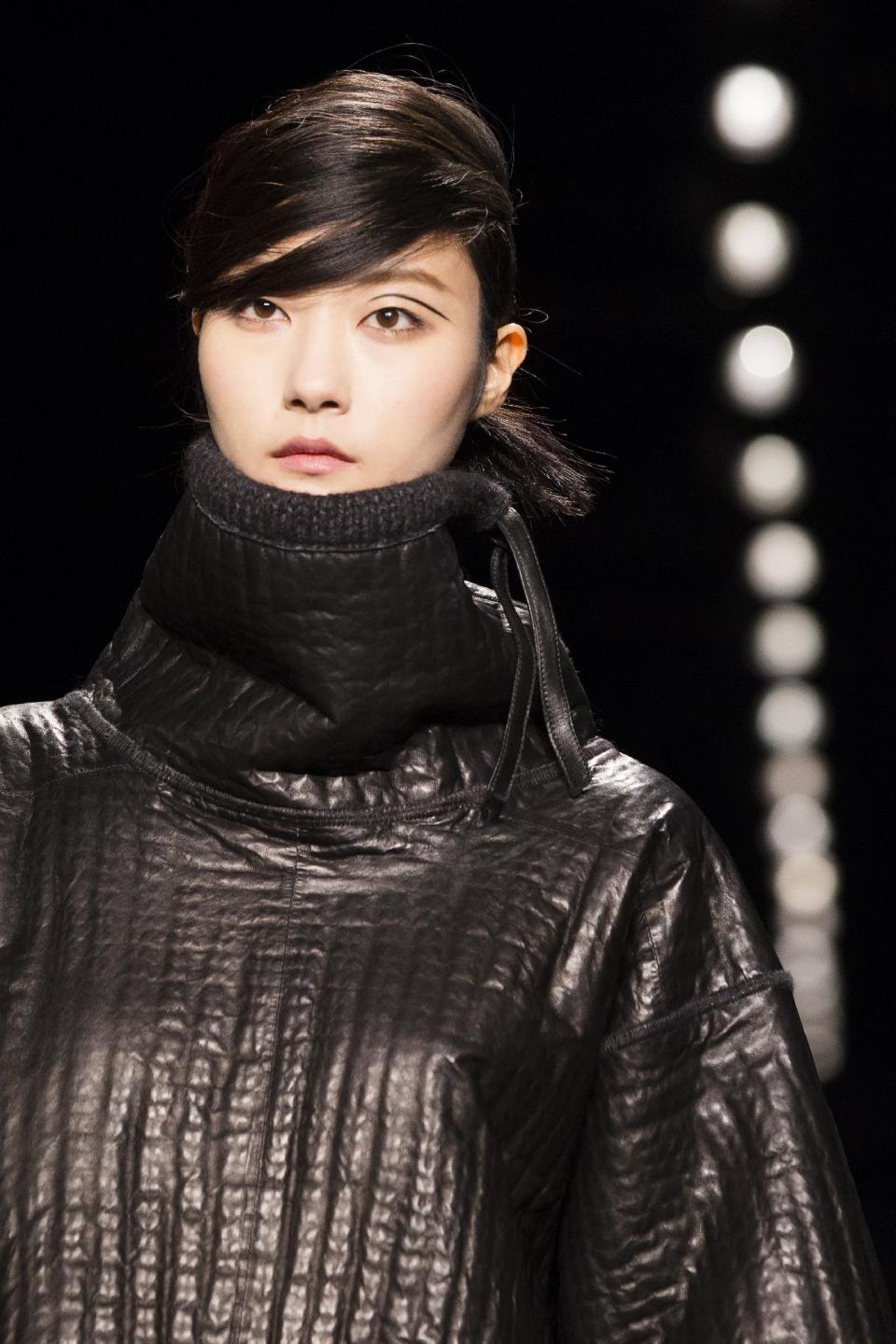 A model walks the runway at the presentation of the Rag & Bone Fall 2013 fashion collection during Fashion Week, Friday, Feb. 8, 2013, in New York. (AP Photo/John Minchillo)